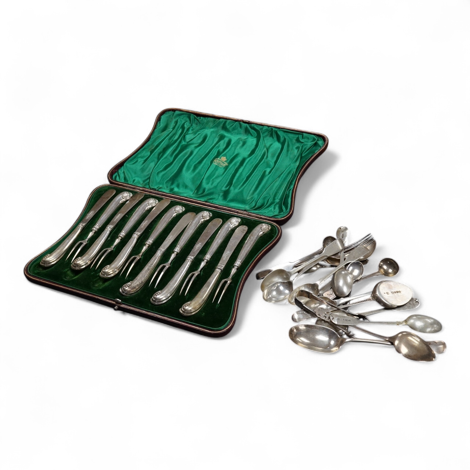 A cased set of six pairs of silver pistol handled dessert eaters by James Dixon & Sons, Sheffield, 1896, loaded, (a.f.), together with a small quantity of assorted silver flatware, 10oz.